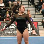 Sienna Taylor competes in the floor exercise where she scored 8.250. (Mark Krulish/Kitsap News Group)