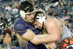 North Kitsaps Nouh Hammou looks to pull Mac Laird of Ephrata to the mat in the 2A 195 finals. Hammou finished second in the bracket. (Mark Krulish/Kitsap News Group)
