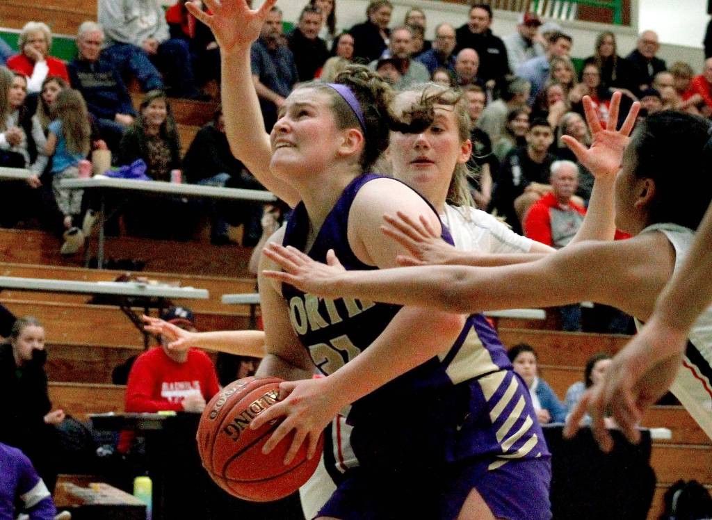 North Kitsap senior Georgia Tucker tries to break through the Black Hills defense in her teams regional game. (Mark Krulish/Kitsap News Group)