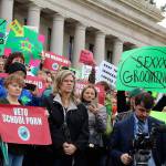 Dissatisfied residents hold signs in protest of the comprehensive sex education mandate. (Cameron Sheppard | WNPA News Service)