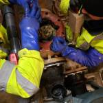 City workers pulled out enough of a clog to fill a five gallon bucket. (Photo courtesy of Mike Lund)