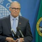 Washington Gov. Jay Inslee pauses at the end of a news conference Monday at the Capitol in Olympia. He announced that schools will remain physically closed for the remainder of the school year due to the coronavirus outbreak, and that public and private school students will continue distance learning through June. (AP Photo/Ted S. Warren)