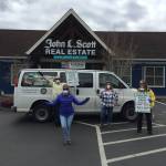 Brokers and staff from John L. Scotts Poulsbo office held a food drive for North Kitsap Fishline. Pictured is one of the small shifts of volunteers who helped orchestrate the drive. (Photo courtesy of John L. Scott)