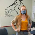 Village Greens clubhouse manager Kaitlyn Spellman says her golf course offers people a recreational alternative during the COVID-19 pandemic. (Bob Smith | Kitsap Daily News)