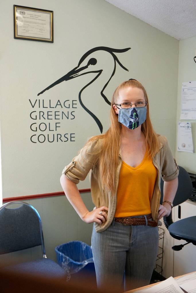 Village Greens clubhouse manager Kaitlyn Spellman says her golf course offers people a recreational alternative during the COVID-19 pandemic. (Bob Smith | Kitsap Daily News)