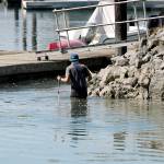 <em>Nance attempts to navigate waist deep water near Point Monroe.</em> Mark Krulish/Kitsap News Group