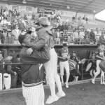 Virgil Taylor celebrates with his son, David, who served as the bat boy for North Kitsaps 1988 state championship team. (Contributed photo by the Taylor Family)
