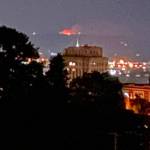 A brush fire at the extreme end of Kitsap County is visible from Tacoma General Hospital on Monday. (SKFR photo)