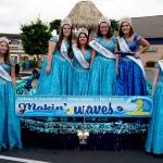 Fathoms O Fun Festivals Royalty Court atop the Fathoms float last weekend: Junior Princess Miah Strombach; Senior Princess Kate Thompson; Senior Princess Neveah Wingate; Senior Princess Veronica Mihai; Queen Danyelle Wilcox; and Duchess Zoe Hauenstein. (Bob Smith | Kitsap Daily News)