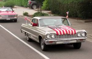Car Cruise braves the smoke as it rolls through Poulsbo