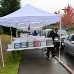 Families drive through to pick up materials, meals in BI