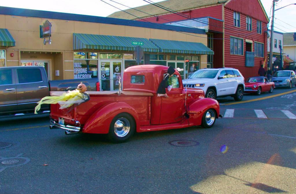 Scarecrow going on a joy ride in the farmers truck