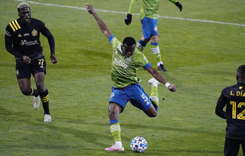 Seattle defender Nouhou lines up a shot on goal. (Mike Fiechtner/Sounders FC Communications)