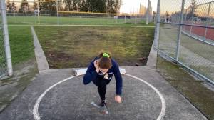 Charlotte Bourgeois gets set to throw the shot put. Courtesy photo