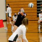 North Kitsap libero Autumn Carver digs out a spike. (Mark Krulish/Kitsap News Grouop)