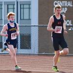 Bainbridges Alex Miller chases down Central Kitsaps Daniel Lizon in the second Olympic League meet of the season. Miller won the race with a time of 17:20.20. (Photo courtesy of Rick Peters)