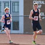 Bainbridges Alex Miller chases down Central Kitsaps Daniel Lizon in the second Olympic League meet of the season. Miller won the race with a time of 17:20.20. (Photo courtesy of Rick Peters)