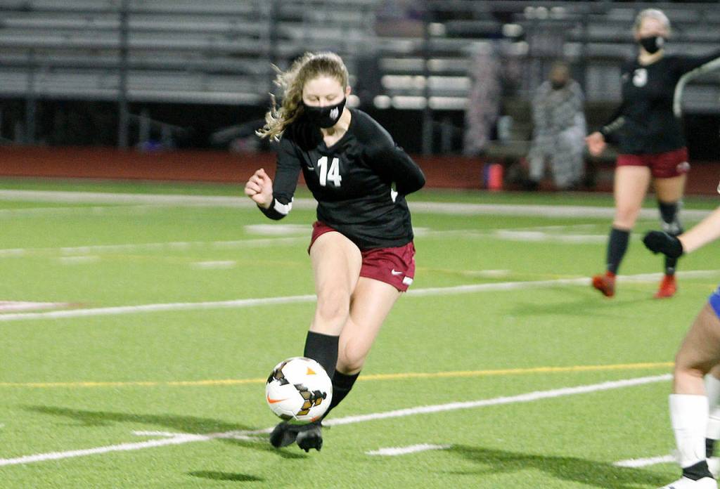 South Kitsap defender Kailey Strong looks to turn upfield against the Knights. (Mark Krulish/Kitsap News Group)