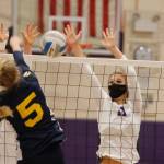 North Kitsaps Maddie Pryde gets in front of a shot from Bainbridges Isabelle Prentice. (Mark Krulish/Kitsap News Group)