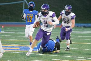 North Kitsap quarterback Colton Bower accounted for over 500 yards of offense in his teams 41-7 win over Bremerton. (Mark Krulish/Kitsap News Group)