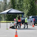 <em>Representatives with the Kitsap Public Health District and nursing students at Olympic College help administer vaccines.				 </em>Ken Park/North Kitsap Herald
