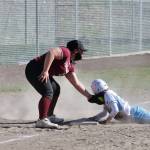 Jordan Blas applies the tag at third base. (Mark Krulish | Kitsap News Group)