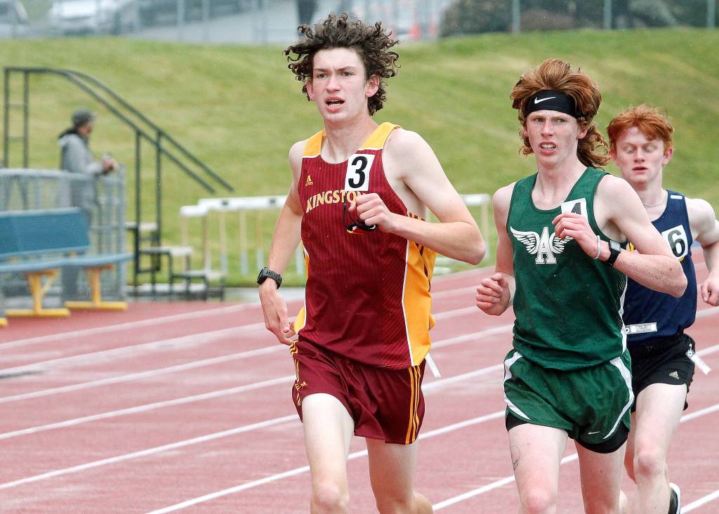 Kingstons Curtis Upton leads Port Angeless Jack Gladfelter and Bainbridges Alex Miller in the 3200. Upton finished third in the race. (Mark Krulish/Kitsap News Group)