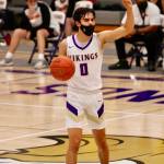 Johny Olmsted calls the play as he directs the offense against Central Kitsap. Olmsted led North Kitsap with 26 points in the 79-51 victory. (Mark Krulish/Kitsap News Group)
