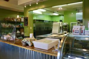 Thusday-Sunday these counters and racks are filled with tasty treats from Big Leaf Maple Bakery but on Tuesdays... it's prep day. (KPark/NKH)