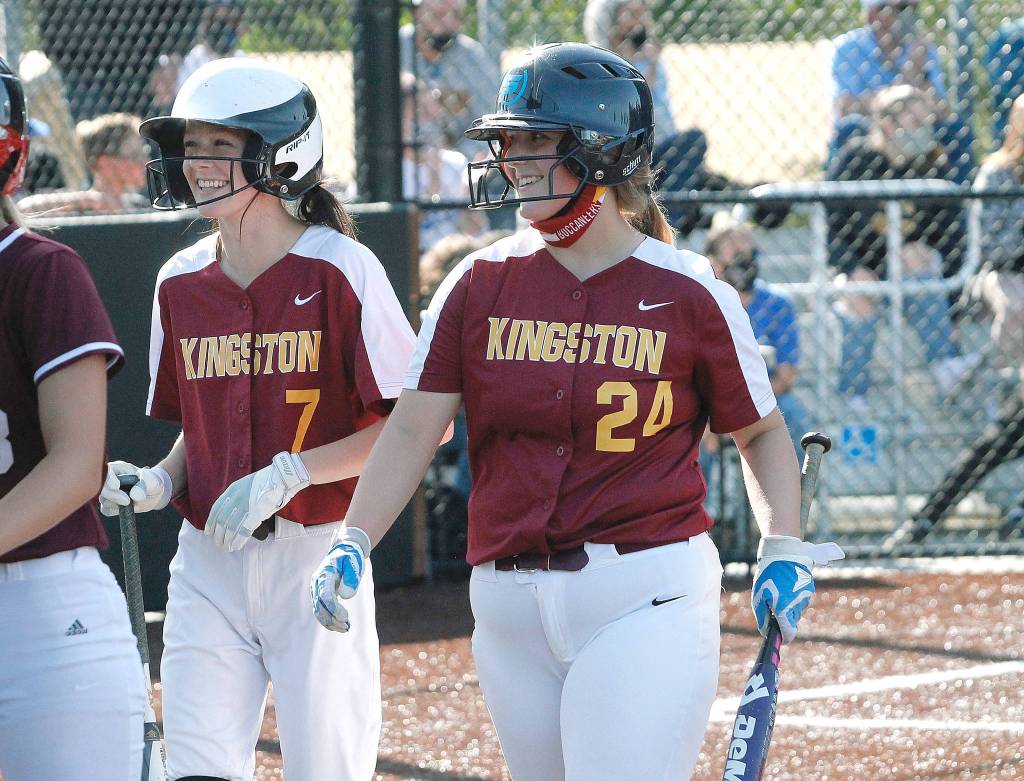 Kingstons Amie Venneman (7) and Keira Alvarez celebrate a run for their American all-stars team. (Mark Krulish/Kitsap News Group)