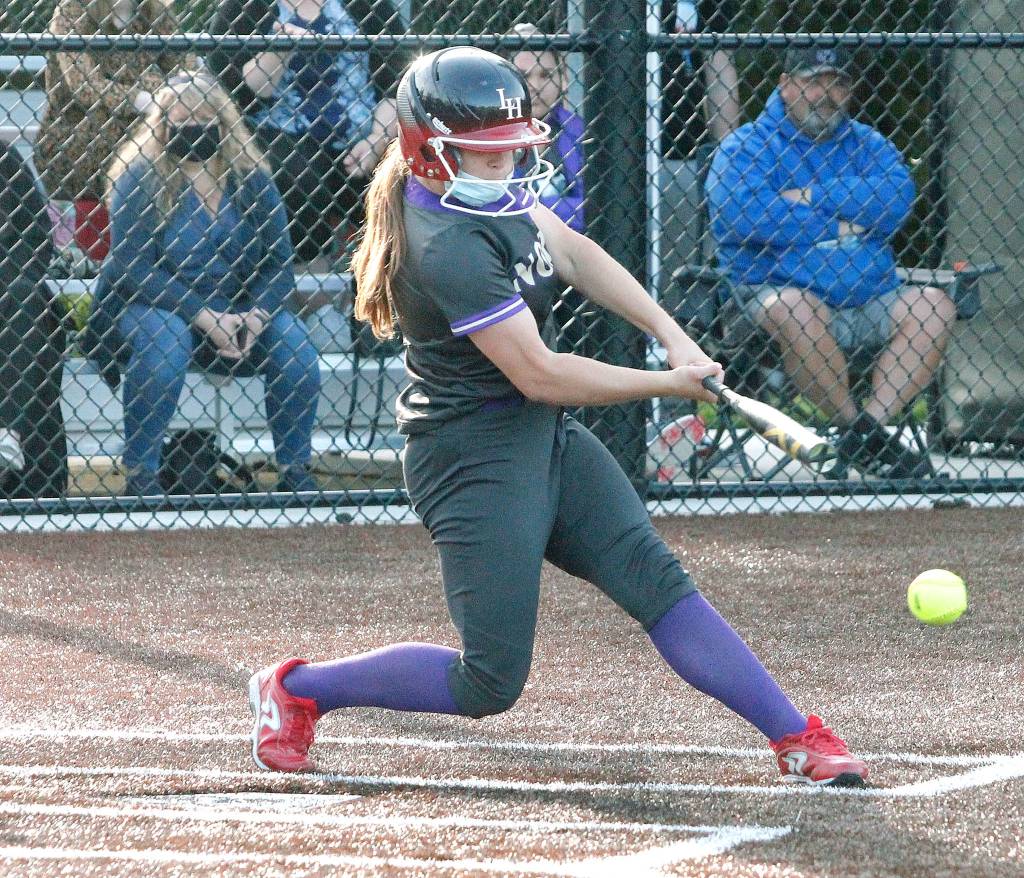 North Kitsaps Mackenzie Phillips connects with a pitch. (Mark Krulish/Kitsap News Group)