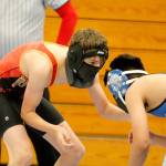 Joseph Woods wrestled an exhibition match after receiving a forefit win in the official 120-pound match against Olympic. (Mark Krulish/Kitsap News Group)
