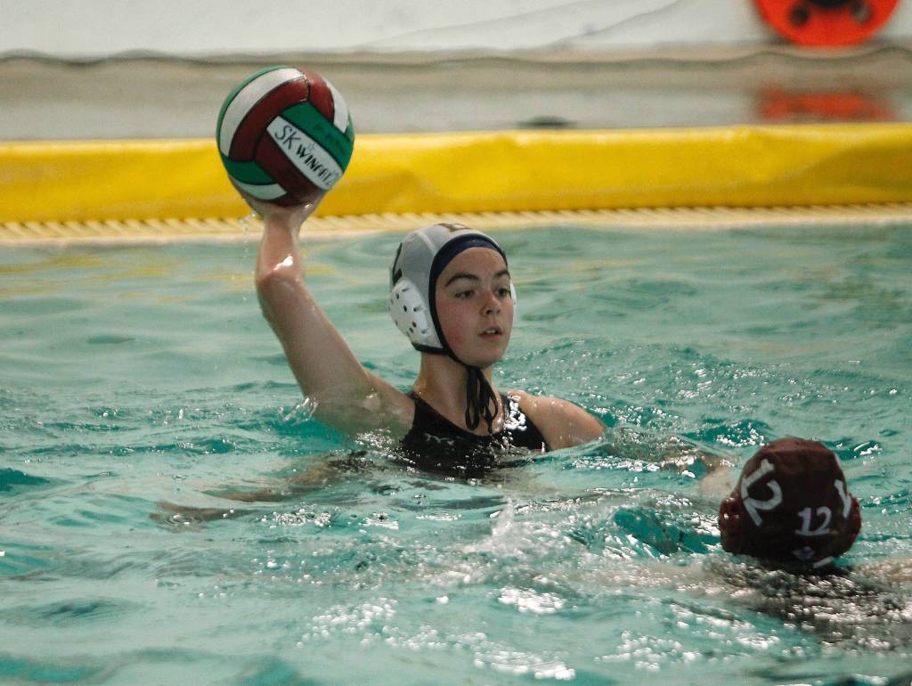 Lillia Manges looks for an open teammate. (Mark Krulish/Kitsap News Group)