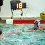 Logan OHare looks to get a shot past South Kitsaps Hank Spangler (14). (Mark Krulish/Kitsap News Group)