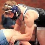 Xavier Eaglin was one of seven seniors honored on Senior Night. He wrestled at 160 pounds and defeated his opponent from Olympia via pin early in the second period. (Mark Krulish/Kitsap News Group)