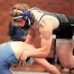 Xavier Eaglin was one of seven seniors honored on Senior Night. He wrestled at 160 pounds and defeated his opponent from Olympia via pin early in the second period. (Mark Krulish/Kitsap News Group)