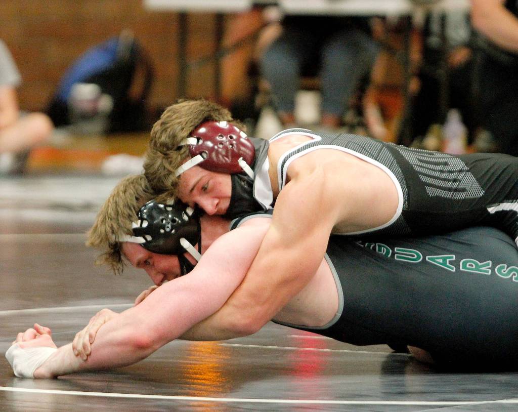 Joseph Laws beat his opponent from Emerald Ridge in a major decision in the 170-pound weight class. (Mark Krulish/Kitsap News Group)