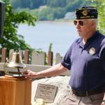 Daniel Phillips rings a bell to honor those who have fallen, specifically members of the American Legion Post 245 who passed away in the last year.
