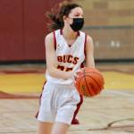 Amie Venneman looks for an open teammate in the fourth quarter against East Jefferson. (Mark Krulish/Kitsap News Group)