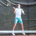 Bainbridges Aiden McLennan goes up to get a high bouncing shot against North Kitsap. (Mark Krulish/Kitsap News Group)