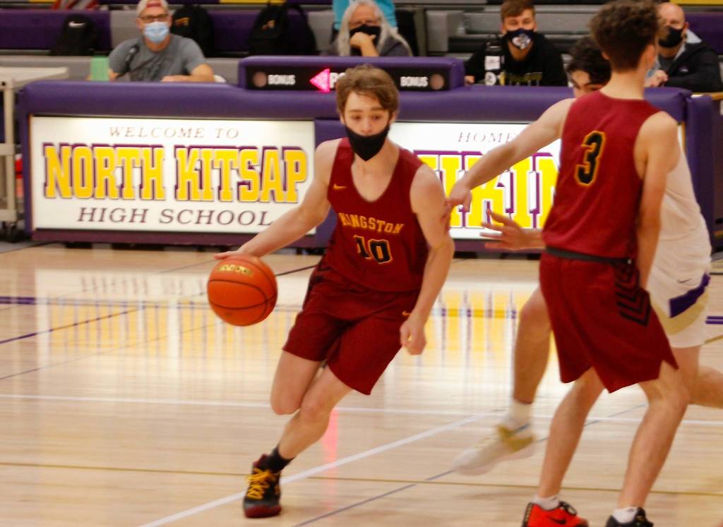 Kingstons Zach Mead looks for a lane to the hoop against North Kitsap. (Mark Krulish/Kitsap News Group)