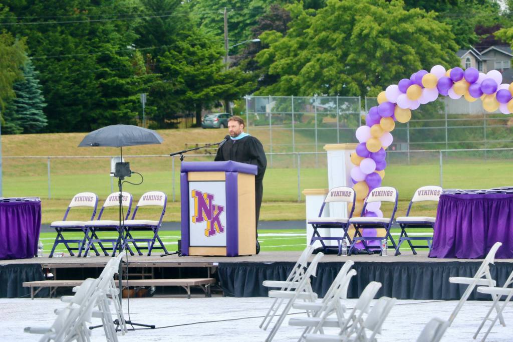 NKHS athletic director Matt Stanford addresses the crowd to go over COVID-safe protocols for the ceremony.(KPark/NKH)