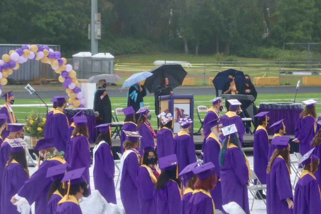 North Kitsap High School principal Megan Sawicki took to the stage to welcome all to the long-awaited graduation day. (KPark/NKH).