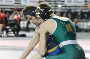 Bainbridges Garrett Swanson, shown here at the 2020 Mat Classic at the Tacoma Dome, was the all-league pick for the 106 weight class. (KNG File Photo)