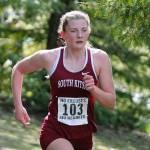 Evelyn Collins-Winn, shown here during the Olympic League cross country championships on Bainbridge Island, will run at the University of Portland in the fall. (Mark Krulish/Kitsap News Group)