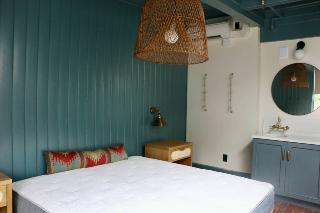 Each of the nine units includes a sink and mirror.