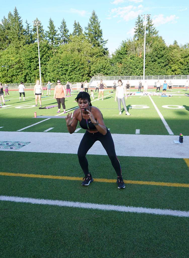 The Port Orchard fitness enthusiast is conducting cardio workout sessions at 6:30 p.m. on Tuesday and Thursday evenings on South Kitsap High Schools Fisher Field football stadium. (Bob Smith | Kitsap Daily News)