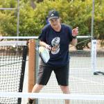 Dana Henry just gets a piece of a shot during a medal match. (Mark Krulish/Kitsap News Group)