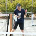 Dana Henry just gets a piece of a shot during a medal match. (Mark Krulish/Kitsap News Group)