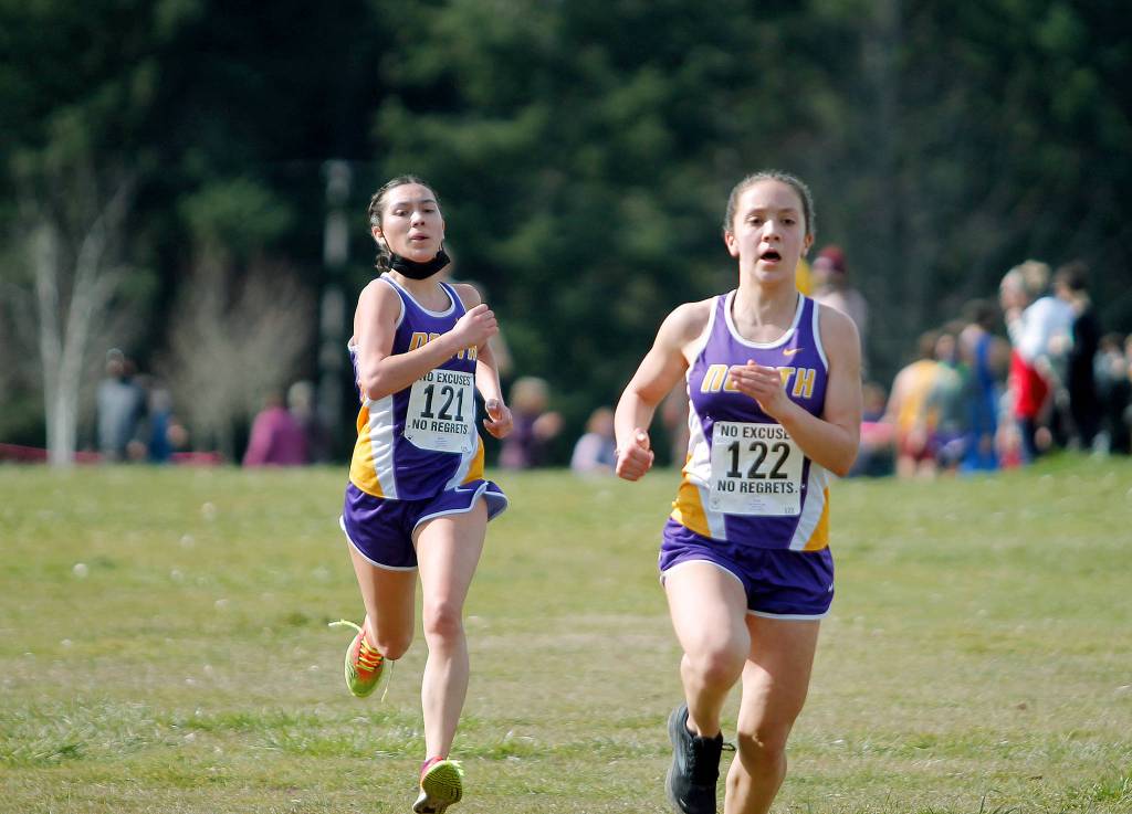 North Kitsaps Genesi Funston and Salix Wartes-Kahl are among the top runners for this years cross country team. (Mark Krulish/Kitsap News Group)